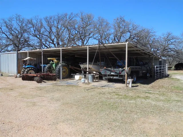 a view of a yard with an outdoor space