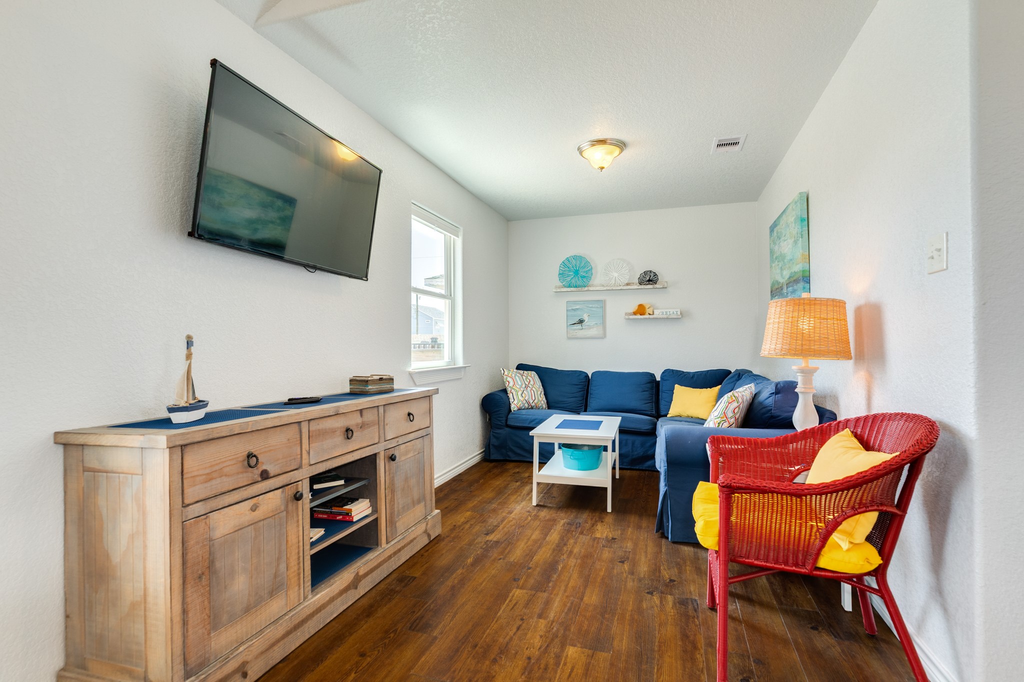 507 Point Lookout Surfside Beach, TX 77541 - Photo 15 of 31 a living room with furniture and a flat screen tv