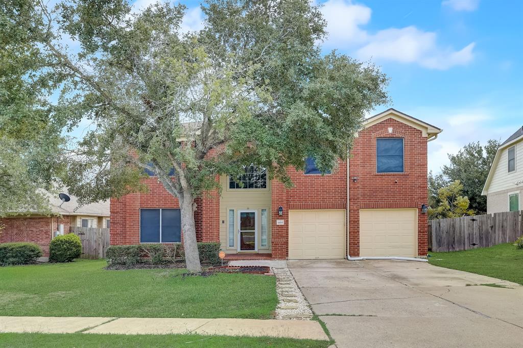 6905 William Wallace Way Austin, TX 78754 - Photo 1 of 19 a front view of a house with a yard and garage
