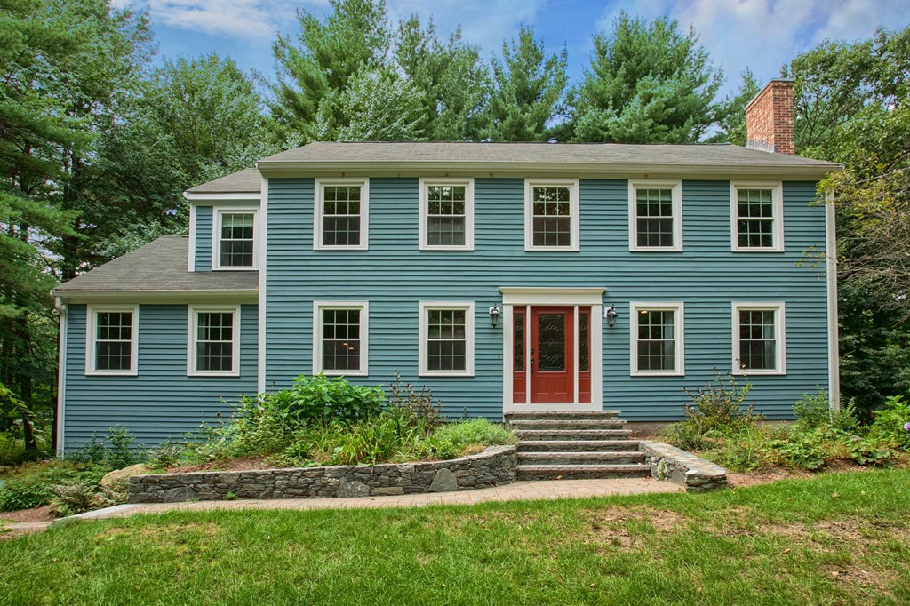 104 Sampson Road Bolton, MA 01740 - Photo 1 of 30 a front view of a house with a yard