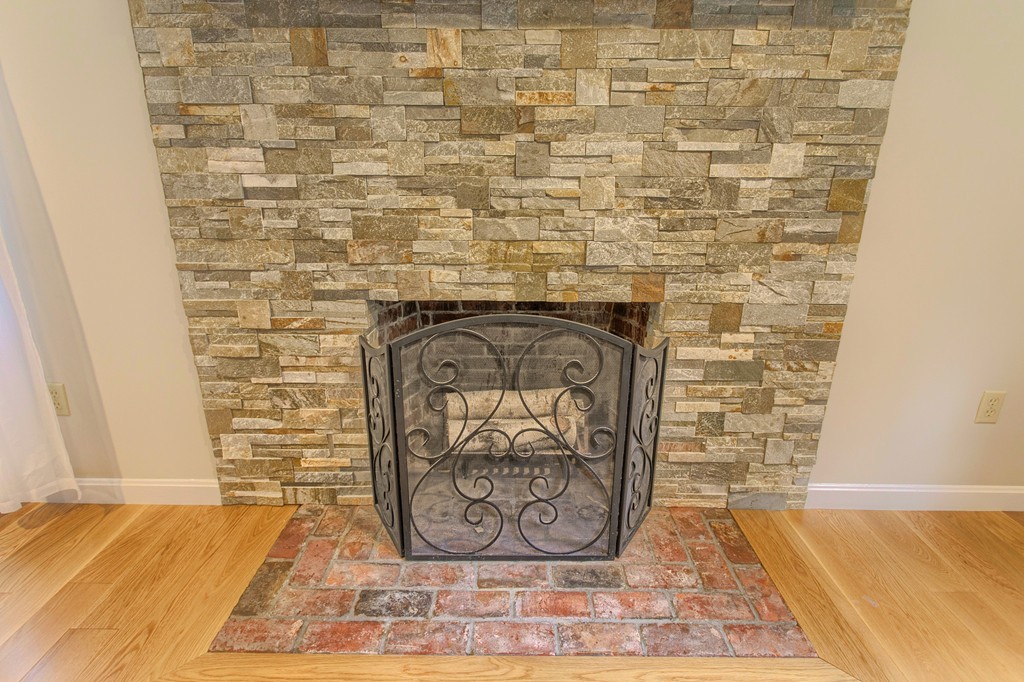 104 Sampson Road Bolton, MA 01740 - Photo 11 of 30 a door with a wooden floor