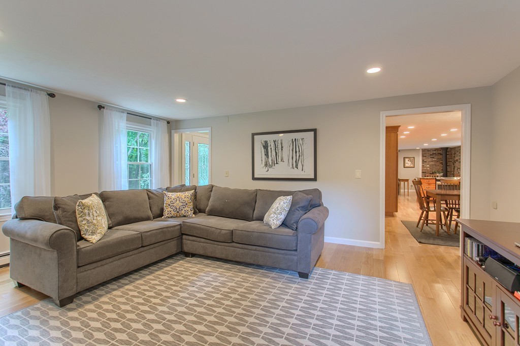 104 Sampson Road Bolton, MA 01740 - Photo 12 of 30 a living room with furniture and a couch