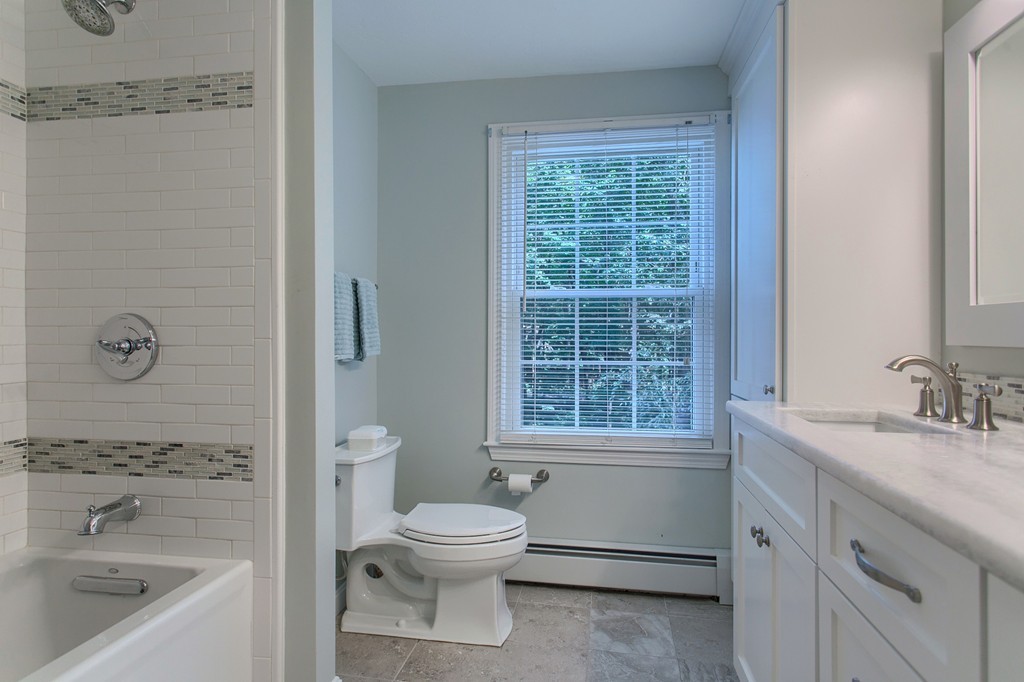 104 Sampson Road Bolton, MA 01740 - Photo 20 of 30 a bathroom with a sink a toilet and shower
