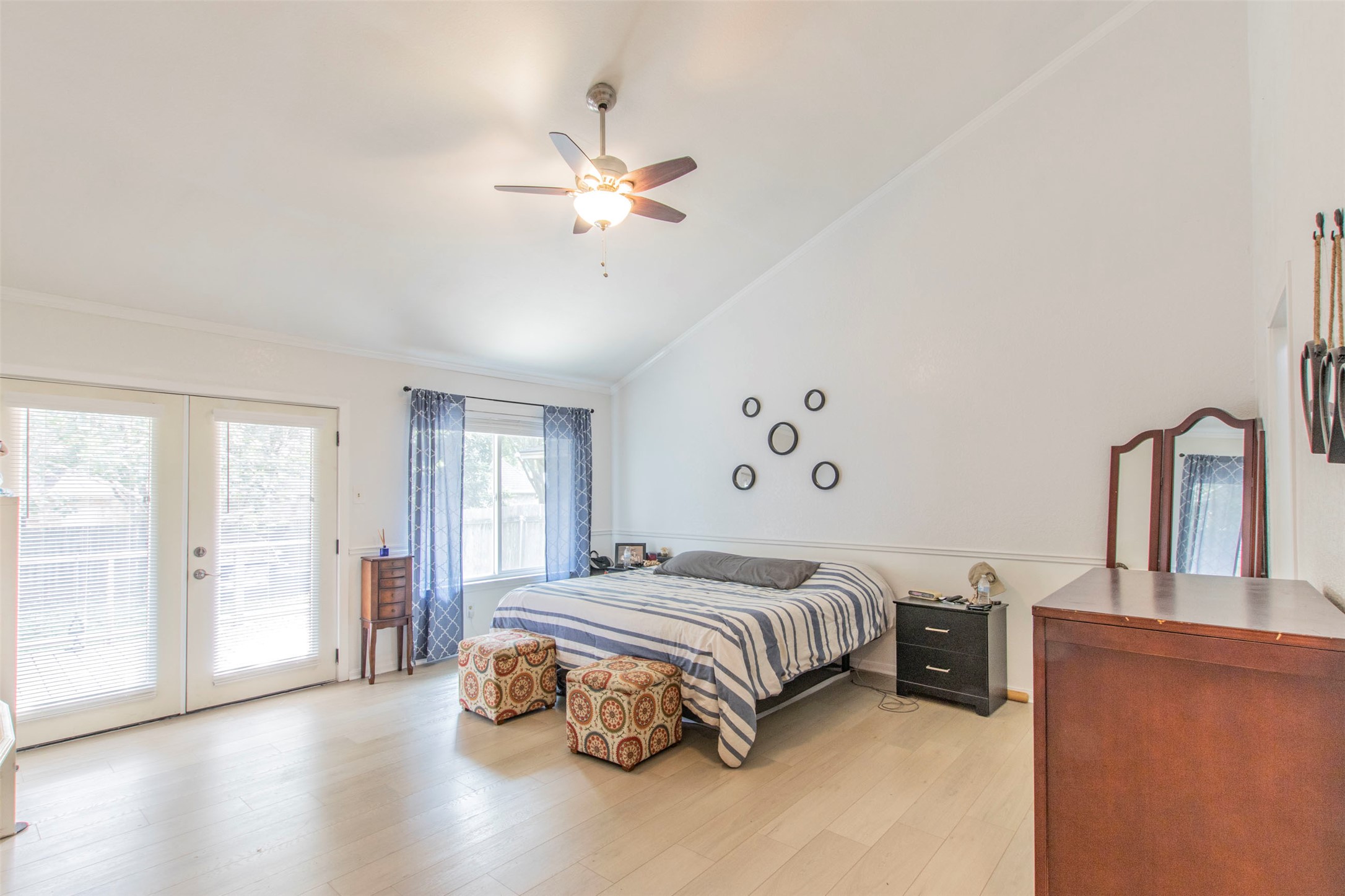 2400 Braemar Cove Austin, TX 78747 - Photo 11 of 20 a spacious bedroom with a bed and window
