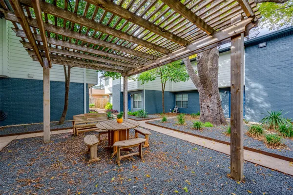 a outdoor space with lots of furniture and garden view
