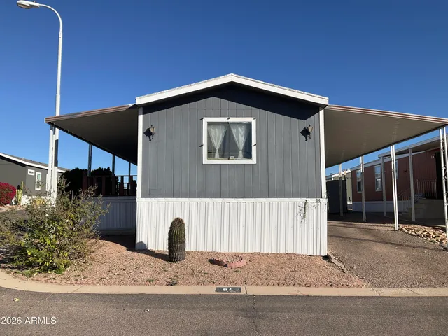 a front view of a house with garage