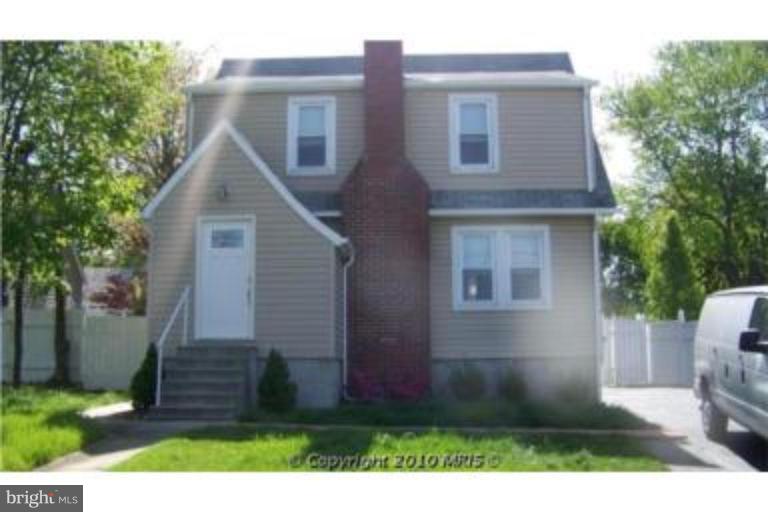 9225 Belair Road Nottingham, MD 21236 - Photo 1 of 21 a front view of a house with a yard