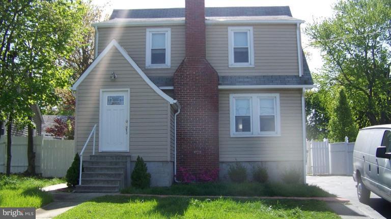 9225 Belair Road Nottingham, MD 21236 - Photo 2 of 21 a front view of house with yard and green space