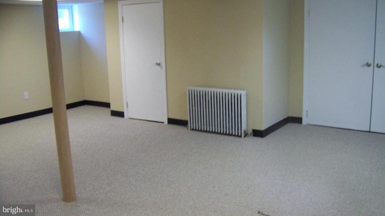 9225 Belair Road Nottingham, MD 21236 - Photo 18 of 21 an empty room with windows