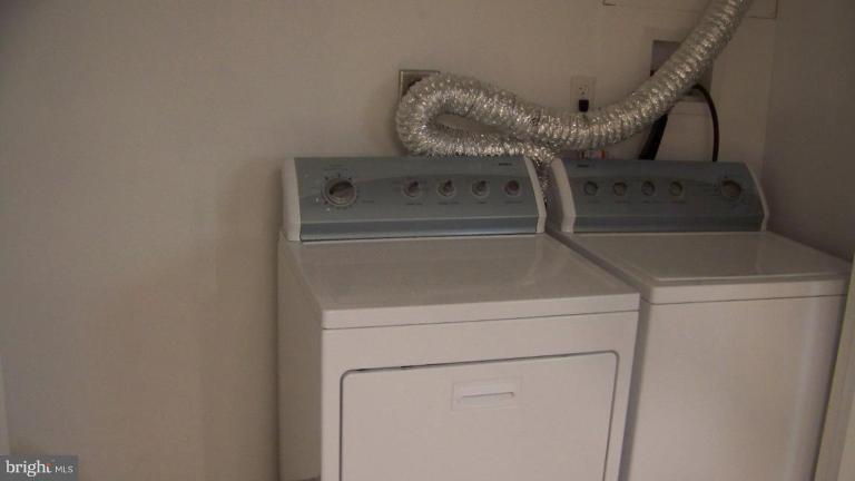 9225 Belair Road Nottingham, MD 21236 - Photo 19 of 21 a utility room with dryer and washer
