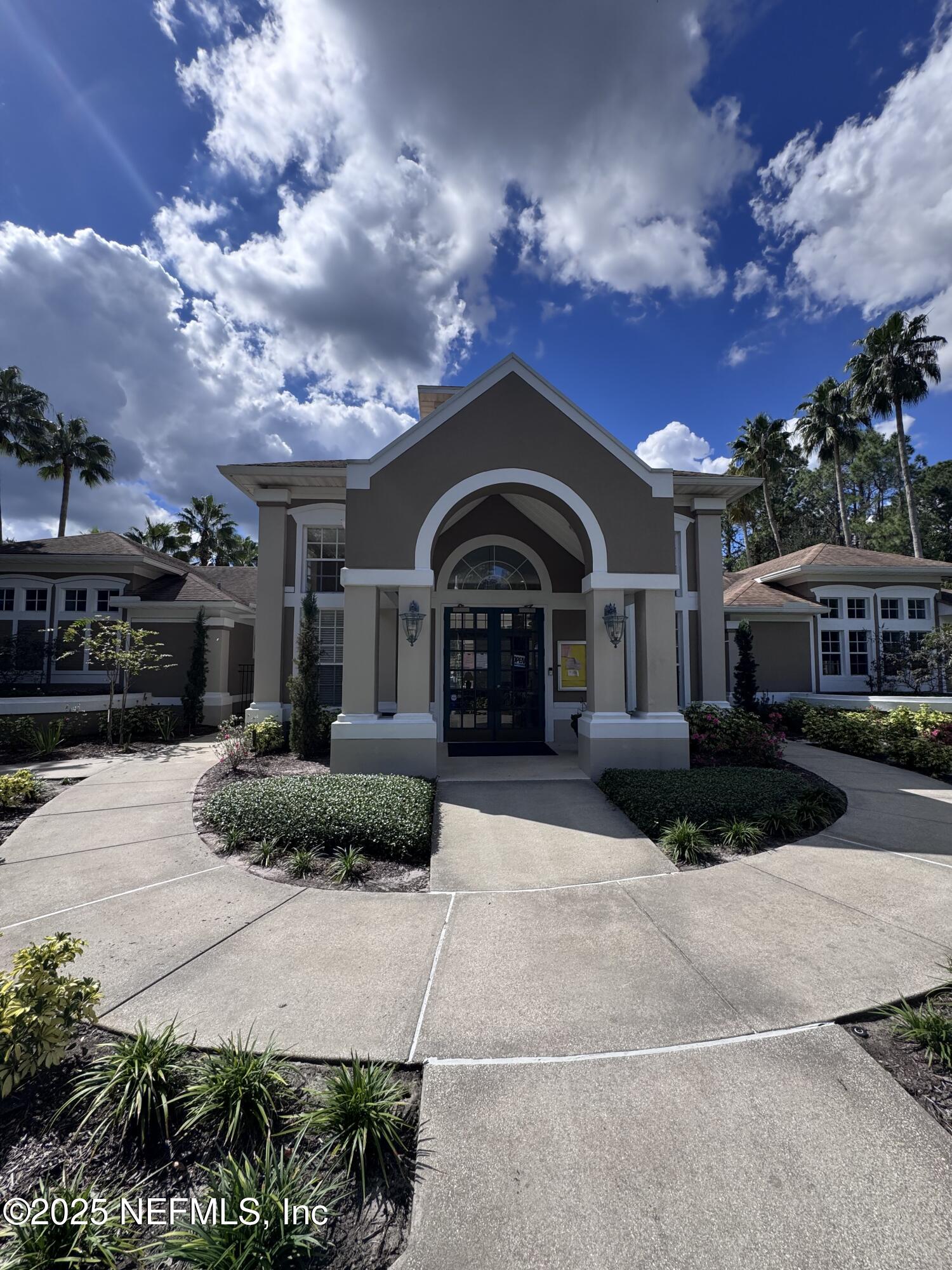 10550 Baymeadows Road, Unit 512 Jacksonville, FL 32256 - Photo 19 of 24 a view of house with yard and entertaining space