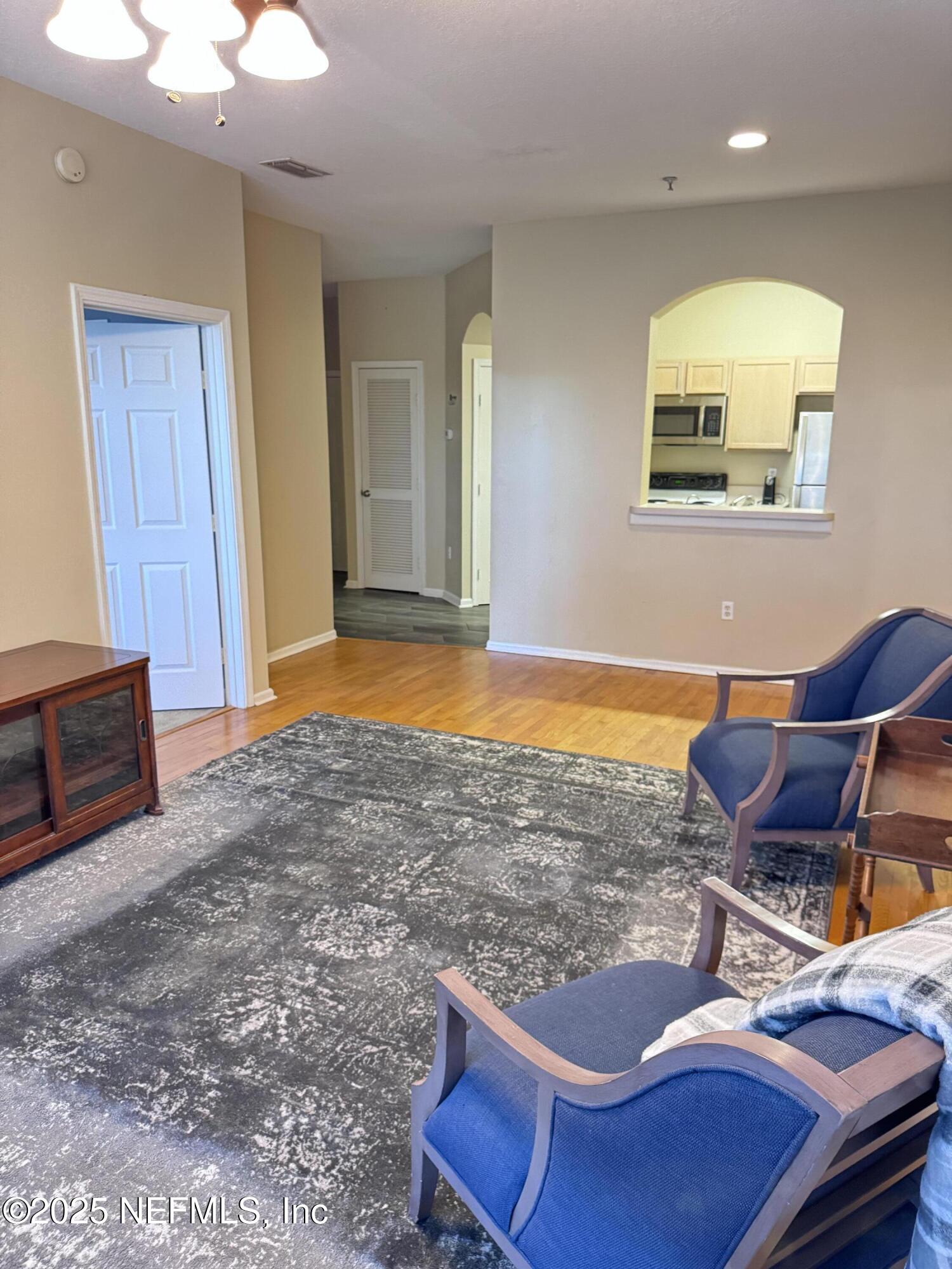 10550 Baymeadows Road, Unit 512 Jacksonville, FL 32256 - Photo 4 of 24 a view of a swimming pool and dining room