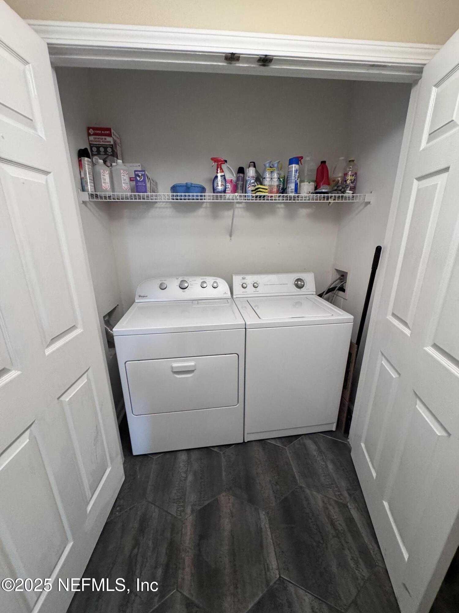 10550 Baymeadows Road, Unit 512 Jacksonville, FL 32256 - Photo 7 of 24 a utility room with dryer and washer
