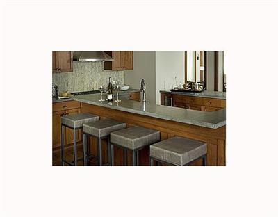 1 Vail Road, Unit 7201 Vail, CO 81657 - Photo 6 of 9 a kitchen with a sink and cabinets