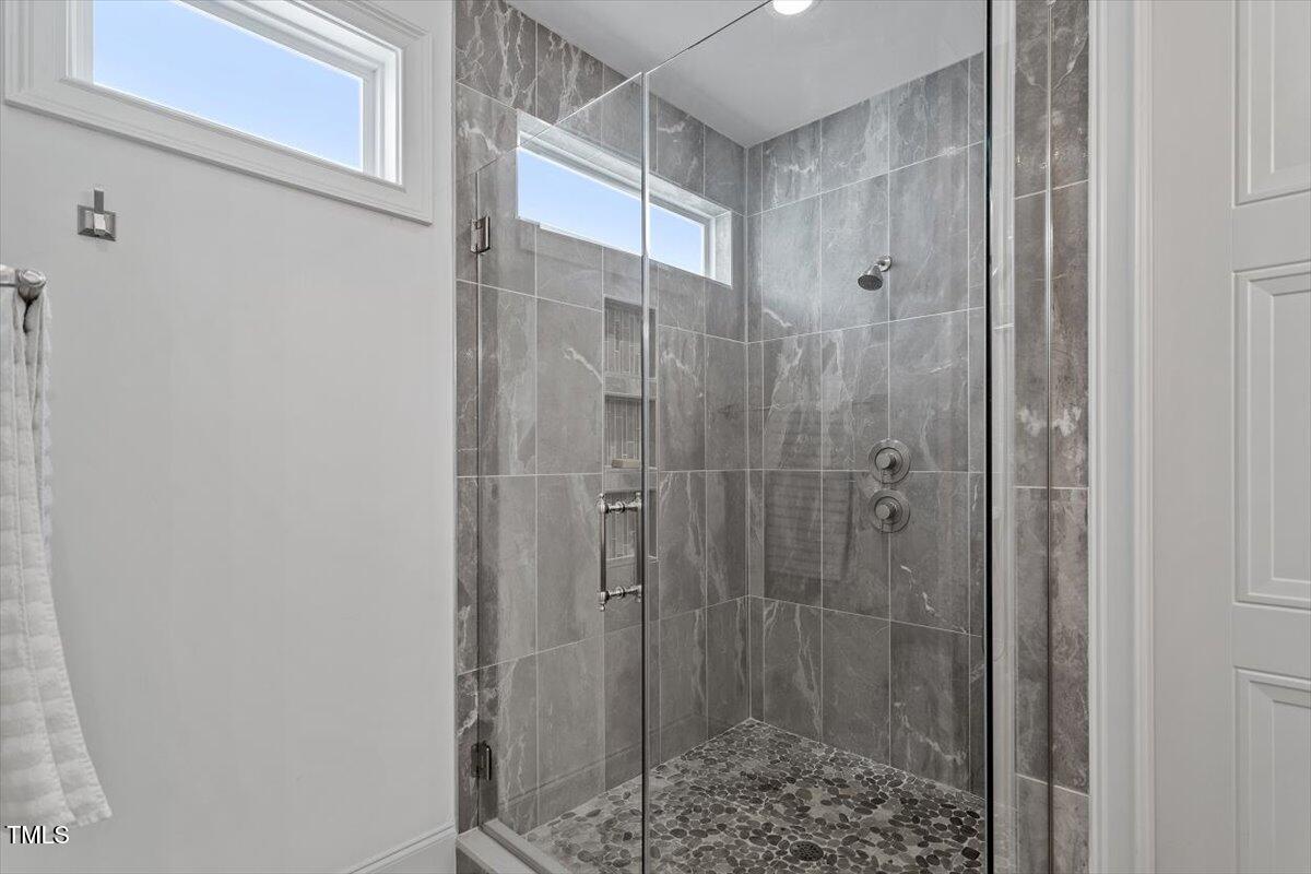 2613 Bedford Avenue Raleigh, NC 27607 - Photo 19 of 44 a bathroom with a shower