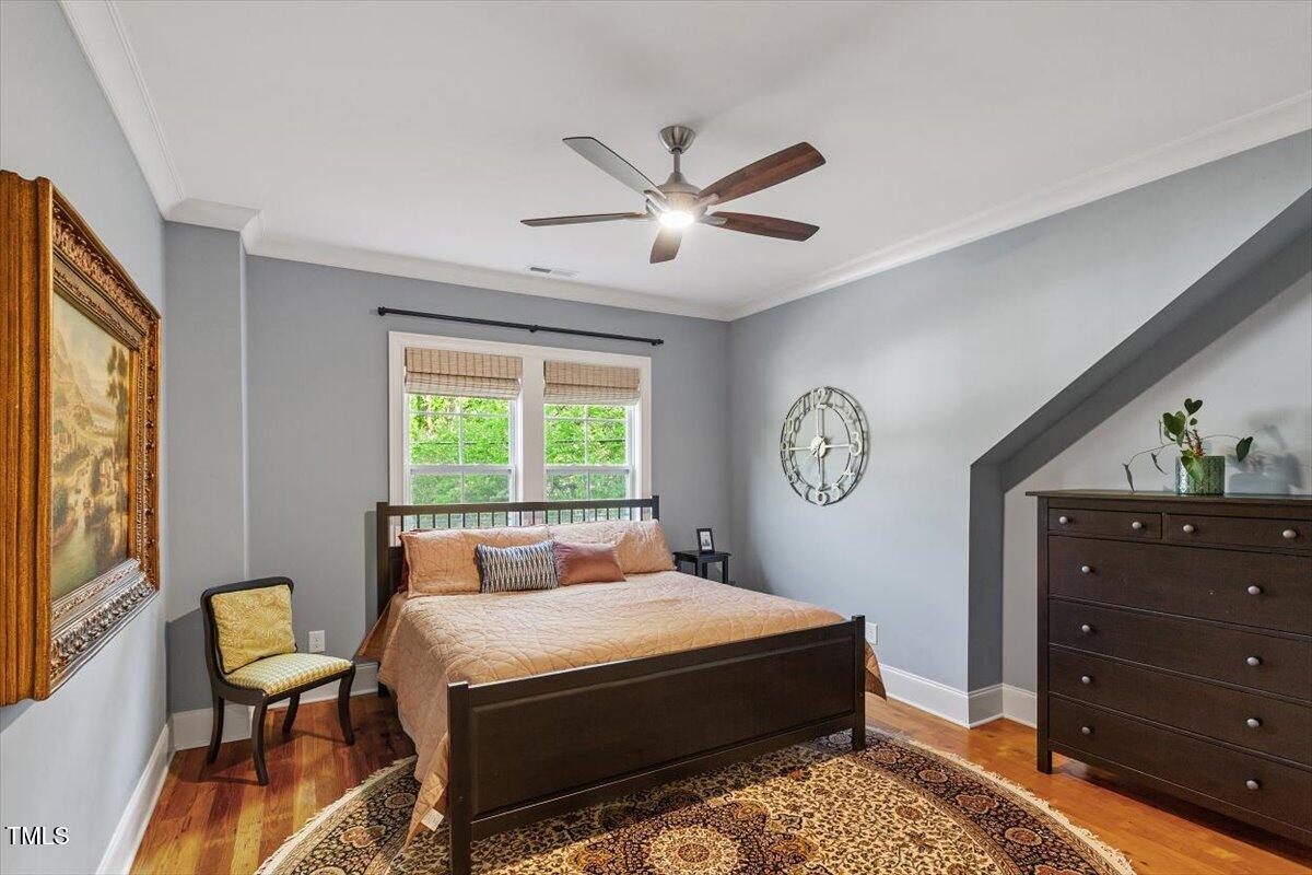 2613 Bedford Avenue Raleigh, NC 27607 - Photo 24 of 44 a bed room with a bed and a window