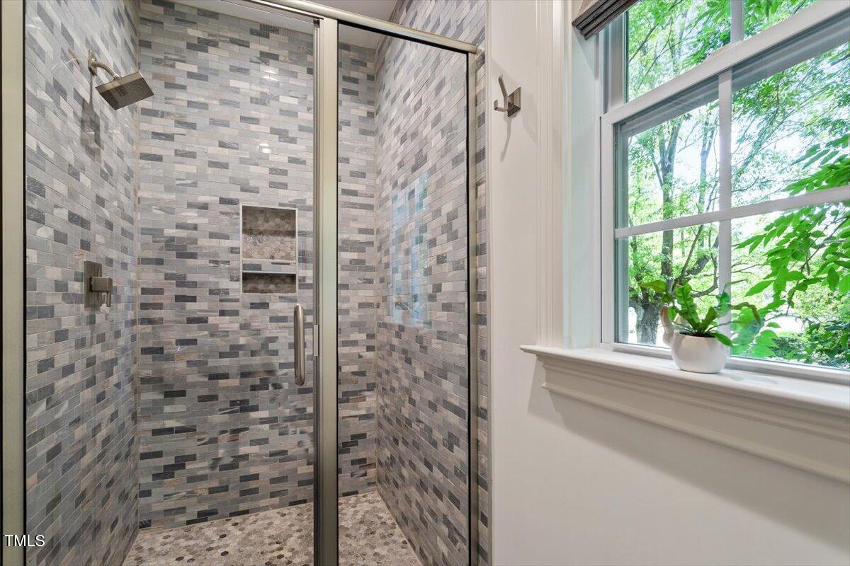 2613 Bedford Avenue Raleigh, NC 27607 - Photo 26 of 44 a bathroom with a shower