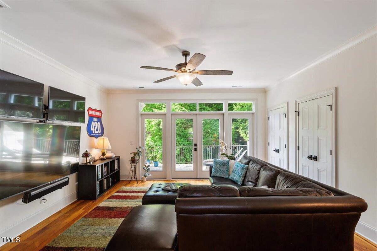 2613 Bedford Avenue Raleigh, NC 27607 - Photo 28 of 44 a room with furniture and flat screen tv