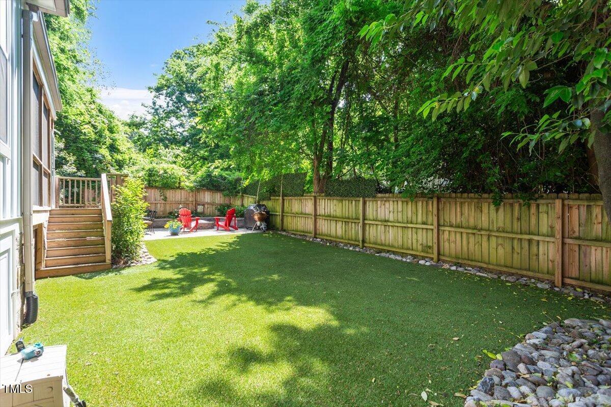2613 Bedford Avenue Raleigh, NC 27607 - Photo 37 of 44 a view of a backyard with a garden