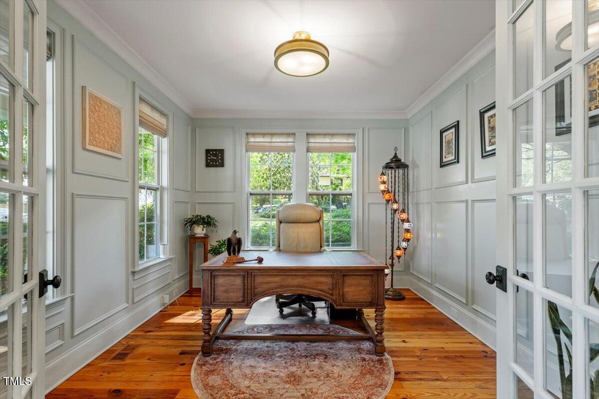 2613 Bedford Avenue Raleigh, NC 27607 - Photo 6 of 44 a living room with furniture and a rug