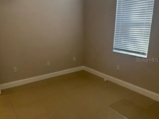 an empty room with a window