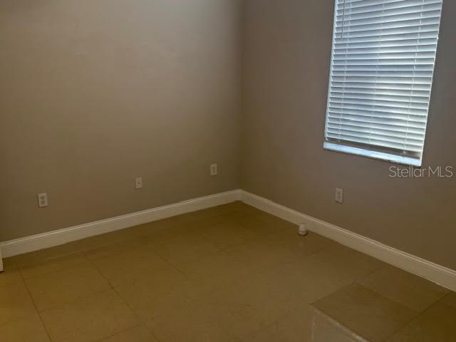 9768 Bay Vista Estates Boulevard Orlando, FL 32836 - Photo 11 of 28 an empty room with a window