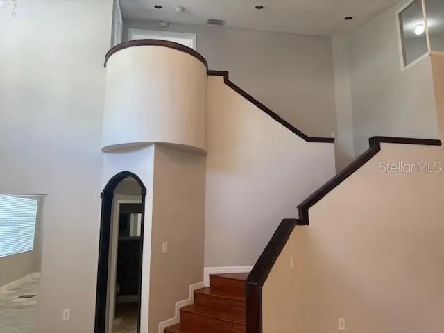 a view of entryway and kitchen