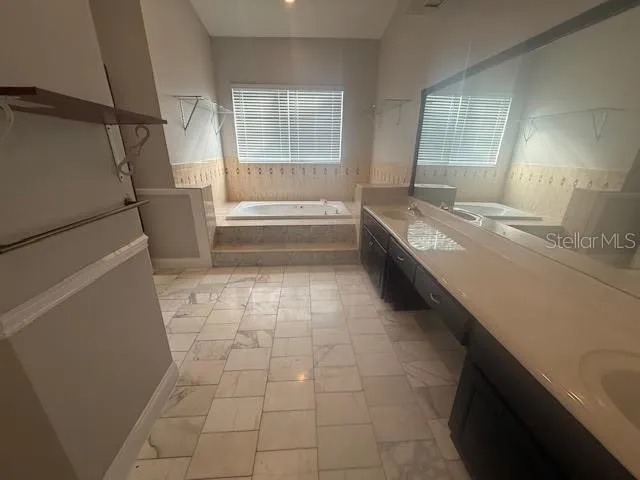 a bathroom with a sink and a toilet