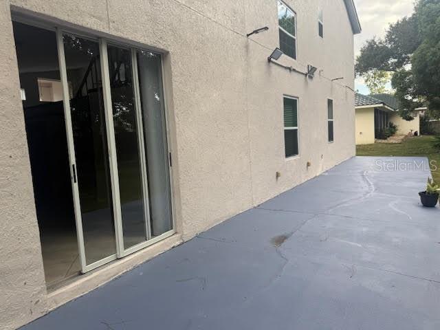 9768 Bay Vista Estates Boulevard Orlando, FL 32836 - Photo 26 of 28 a view of a house with entryway doors