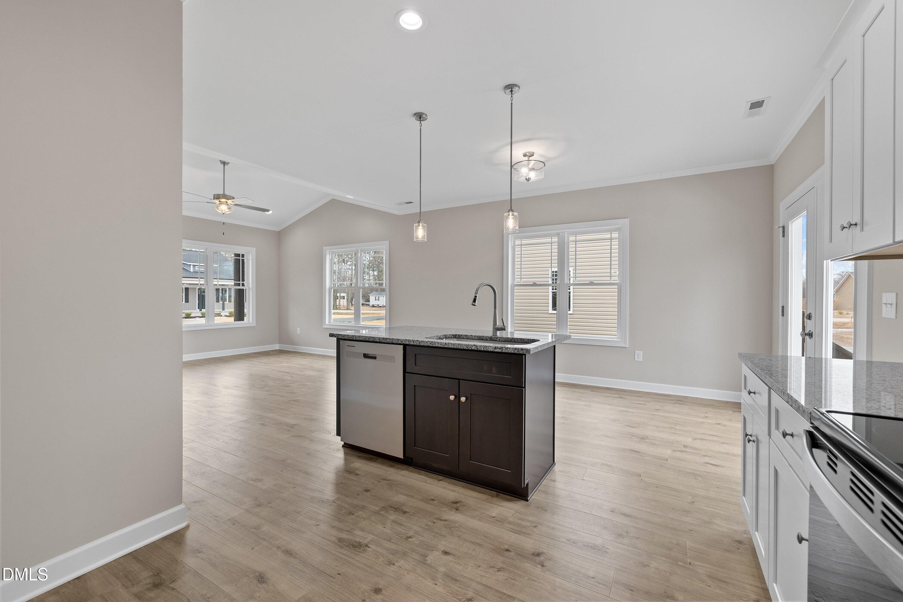 926 Micro Road West Selma, NC 27576 - Photo 23 of 41 a large kitchen with a table and chairs