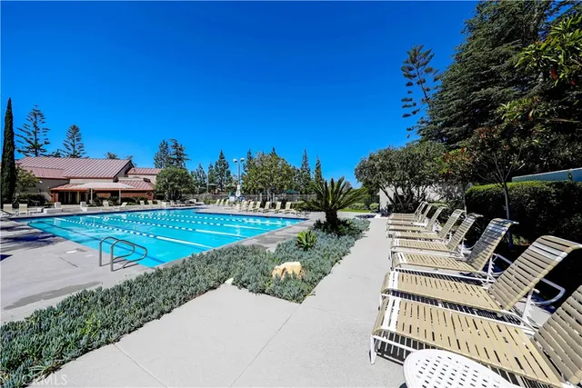 a view of a swimming pool with a patio