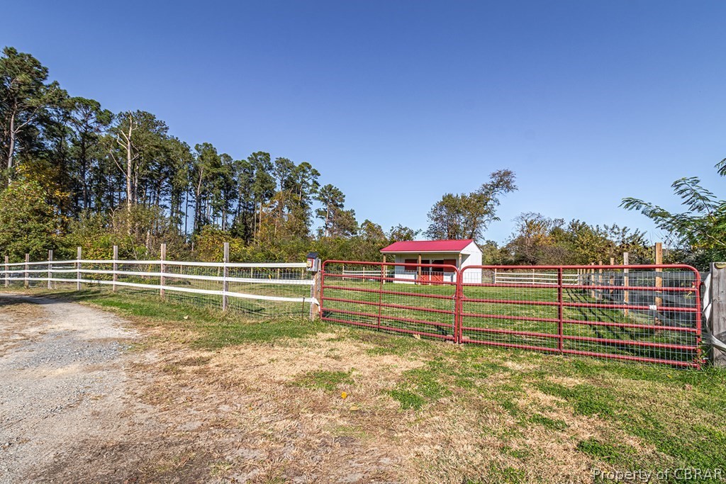 20 Flagstaff Road Lancaster, VA 22503 - Photo 39 of 49 Fenced pasture with solar electric fence