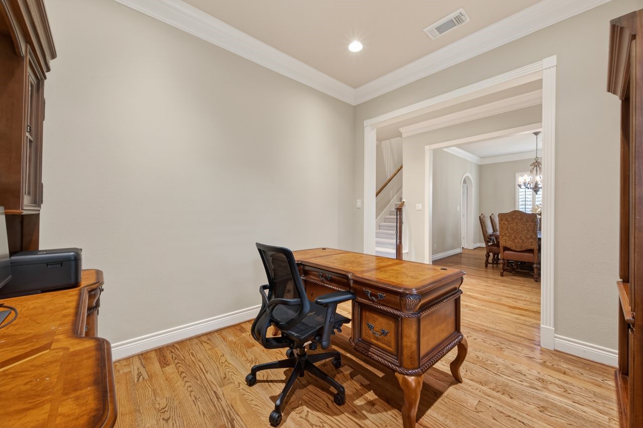 10932 Lasso Lane Houston, TX 77079 - Photo 7 of 38 a room with furniture and wooden floor