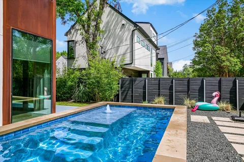 a view of outdoor space yard deck patio and swimming pool