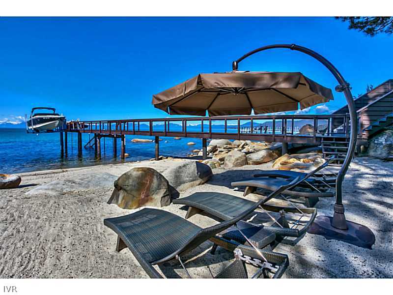 a terrace of a house with outdoor seating
