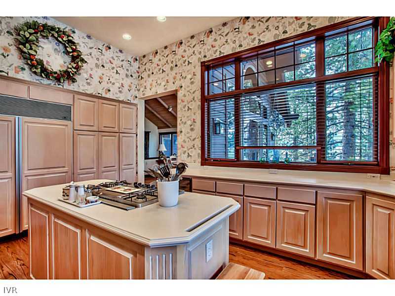 1155 Lakeshore Boulevard Incline Village, NV 89451 - Photo 6 of 18 a kitchen with a sink stove and cabinets