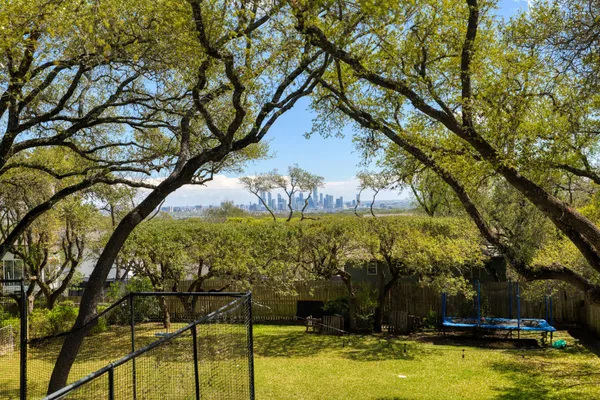 a view of swimming pool with a yard