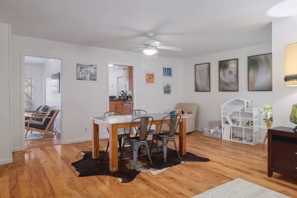 a view of a dining room with furniture