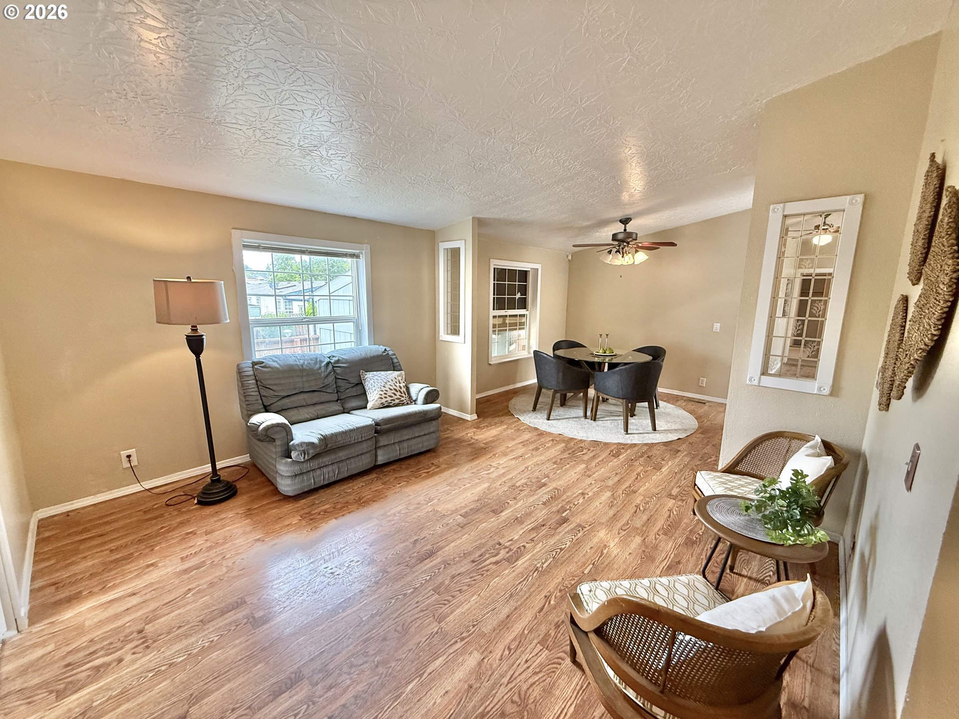 1282 3rd Street, Unit 37 Lafayette, OR 97127 - Photo 22 of 28 a living room with furniture and a wooden floor