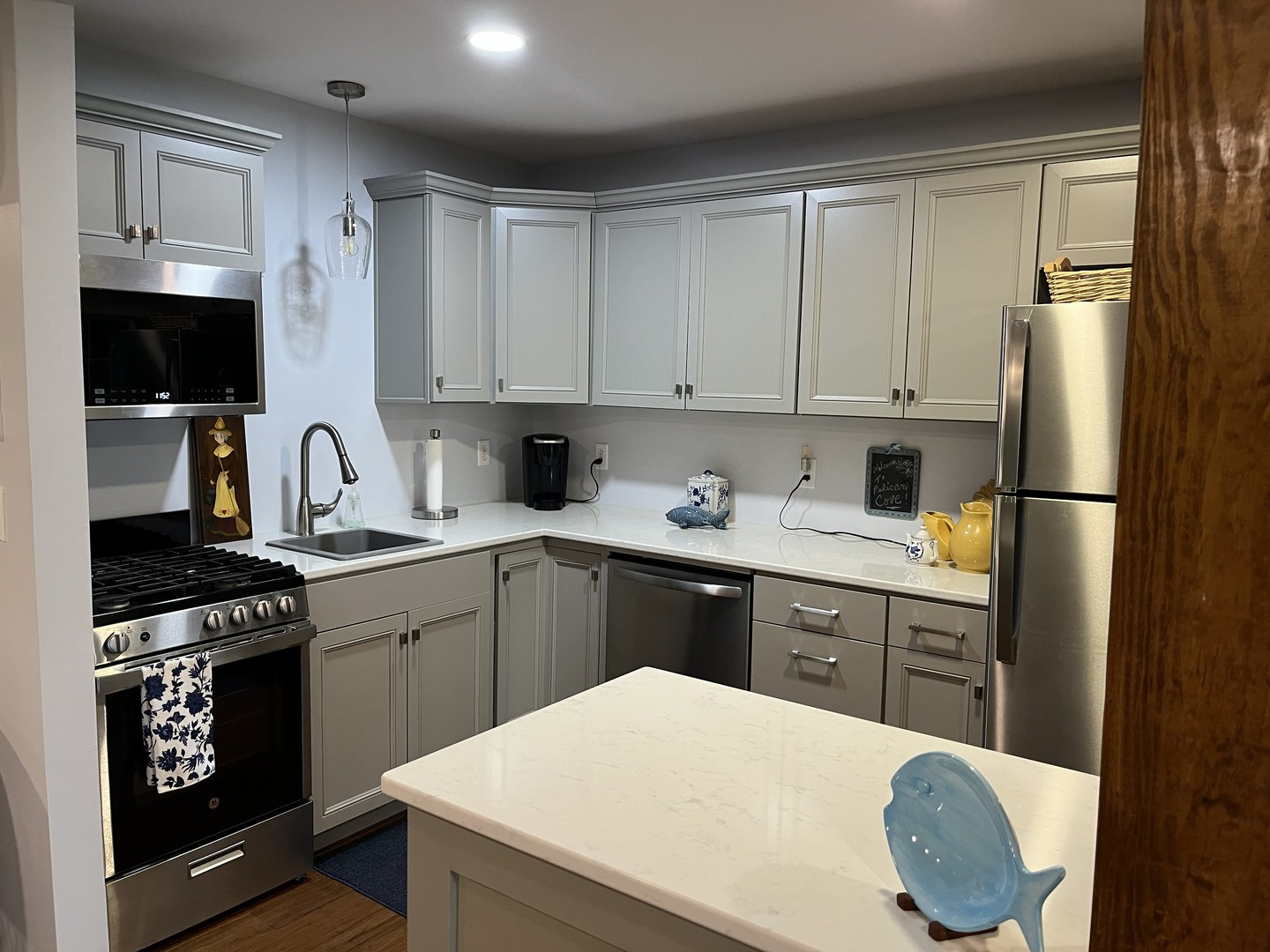 1890 Lackey Lane Centralia, IL 62801 - Photo 2 of 30 a kitchen with a sink a stove and refrigerator