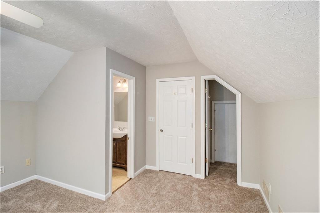 340 Radcliff Trace Covington, GA 30016 - Photo 24 of 38 a view of an empty room and bathroom