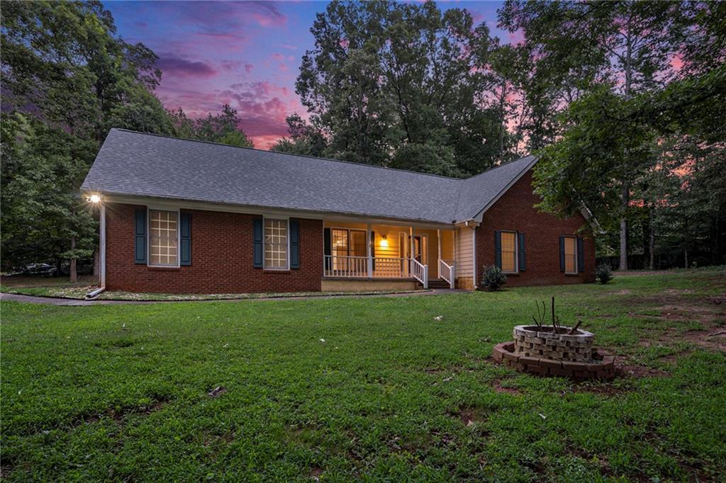 340 Radcliff Trace Covington, GA 30016 - Photo 31 of 38 a view of a house with a yard