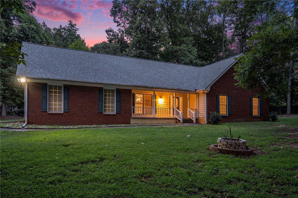 340 Radcliff Trace Covington, GA 30016 - Photo 36 of 38 a view of a house with a backyard