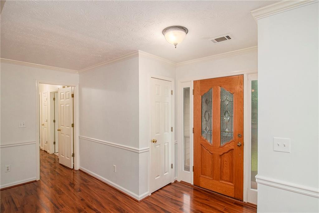 340 Radcliff Trace Covington, GA 30016 - Photo 4 of 38 wooden floor in an empty room