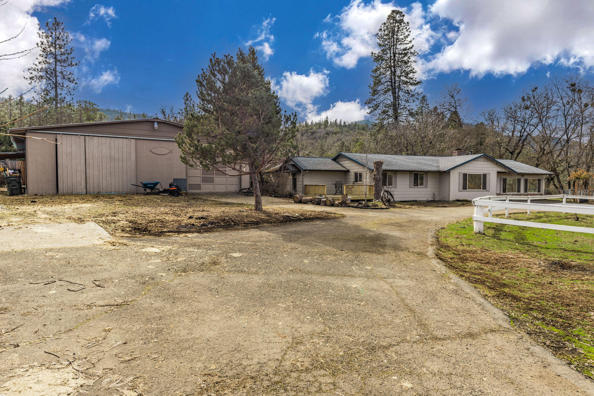 6732 Old Stage Road Central Point, OR 97502 - Photo 29 of 51 a view of a house with a yard covered in snow
