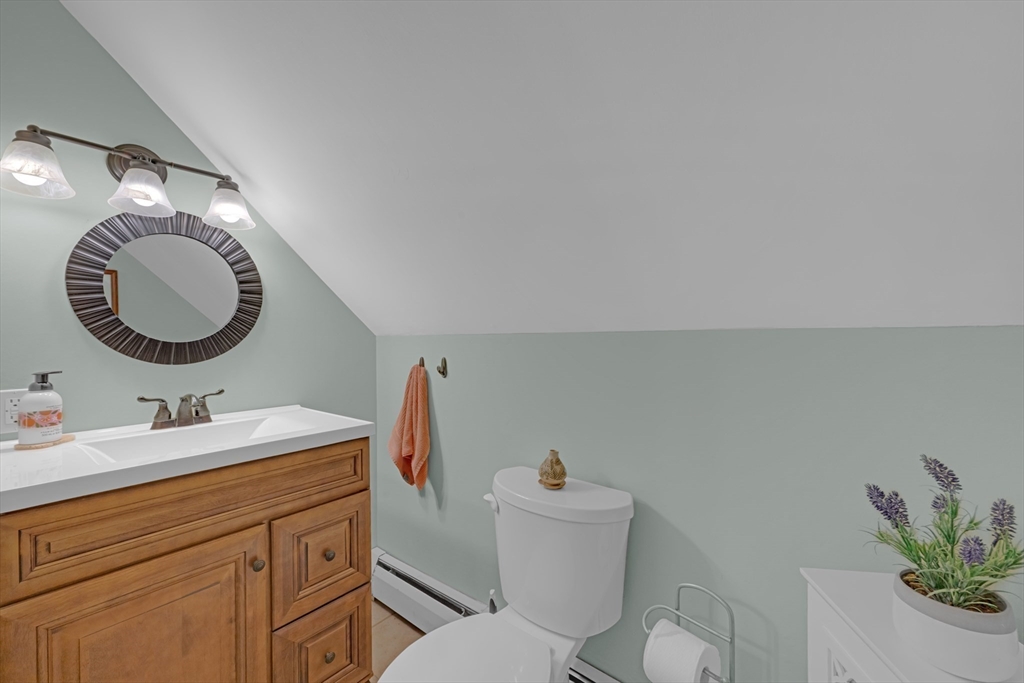 47 Horseshoe Circle Ware, MA 01082 - Photo 25 of 37 a bathroom with a toilet sink vanity granite and mirror