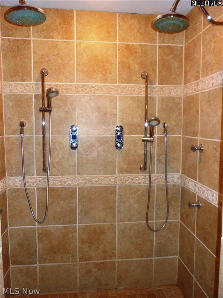8912 Broadview Road Broadview Heights, OH 44147 - Photo 15 of 20 Walk in Custom ceramic shower with top of the line dual Moen Rain shower heads,body sprays and touch controls...