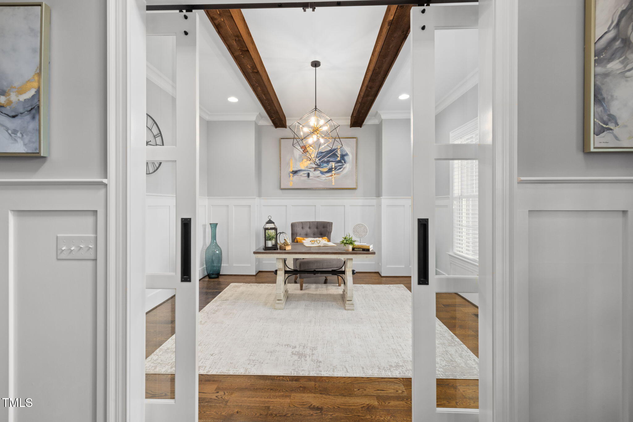 170 Pine Cone Loop Pittsboro, NC 27312 - Photo 11 of 58 a living room with furniture and a chandelier