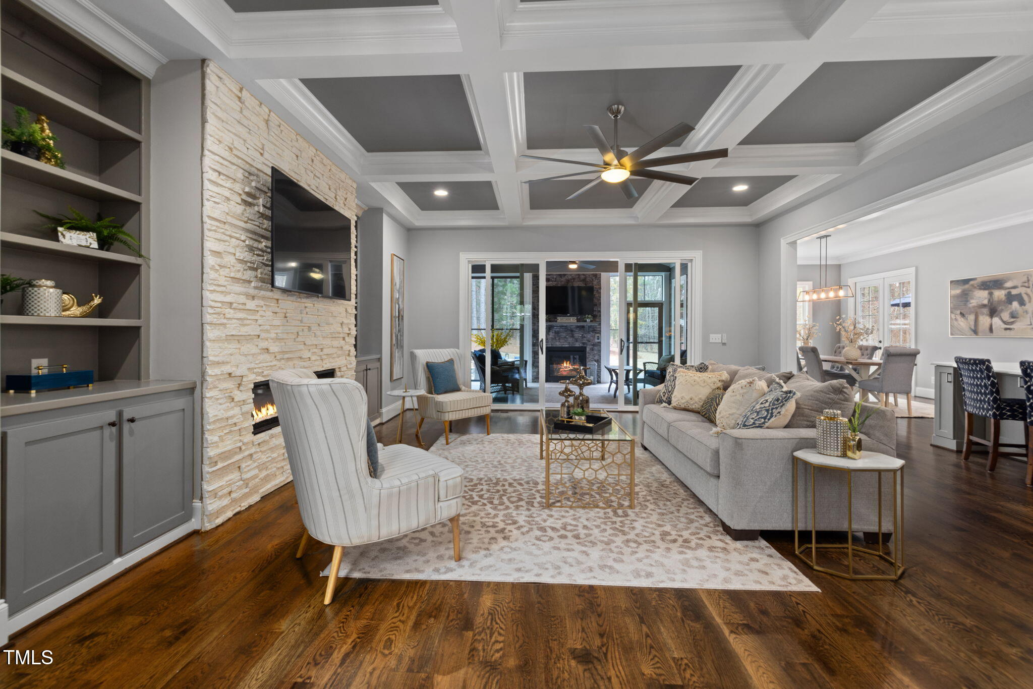 170 Pine Cone Loop Pittsboro, NC 27312 - Photo 17 of 58 a living room with fireplace furniture and a flat screen tv