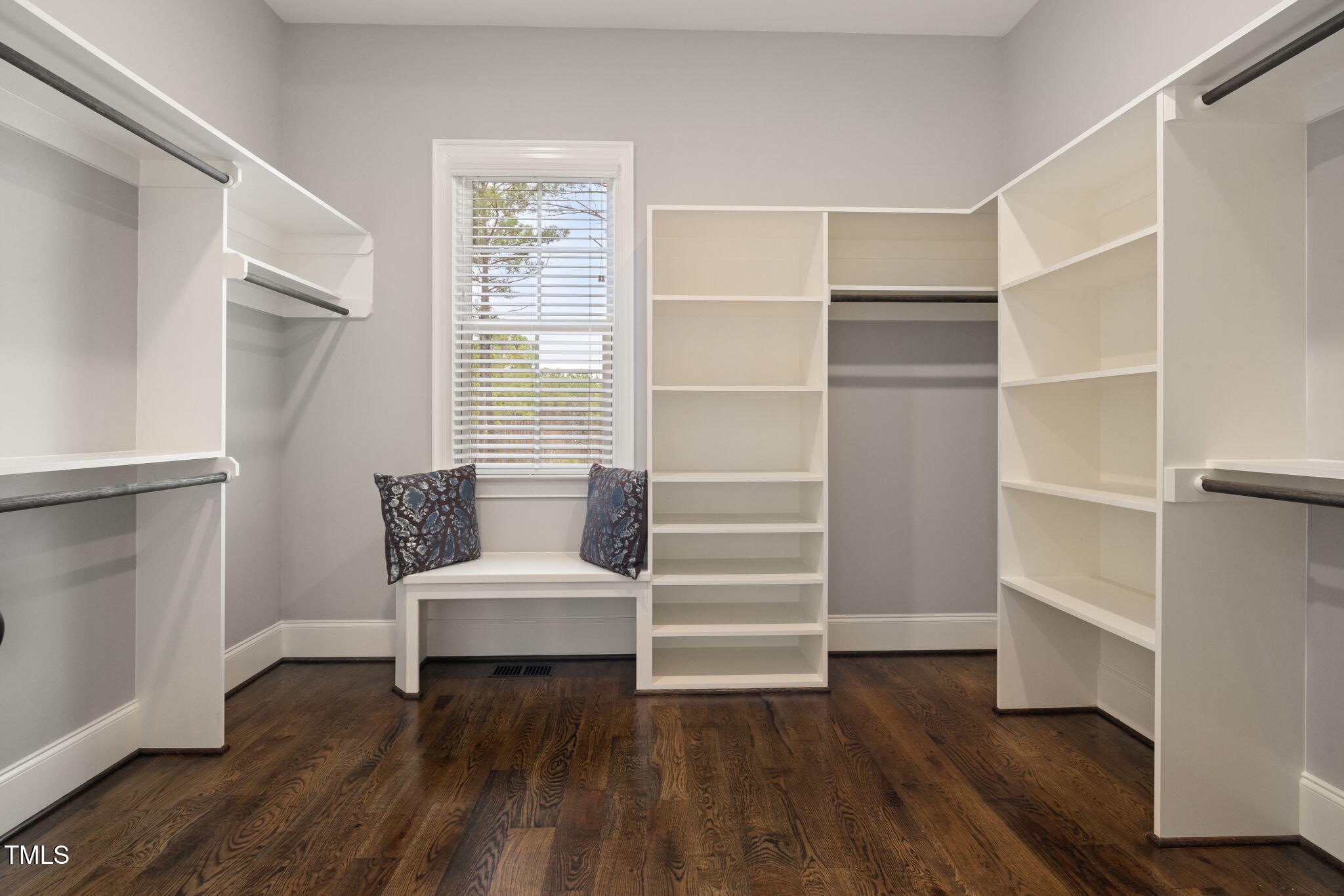 170 Pine Cone Loop Pittsboro, NC 27312 - Photo 32 of 58 a view of walk in closet with wooden floor and chair